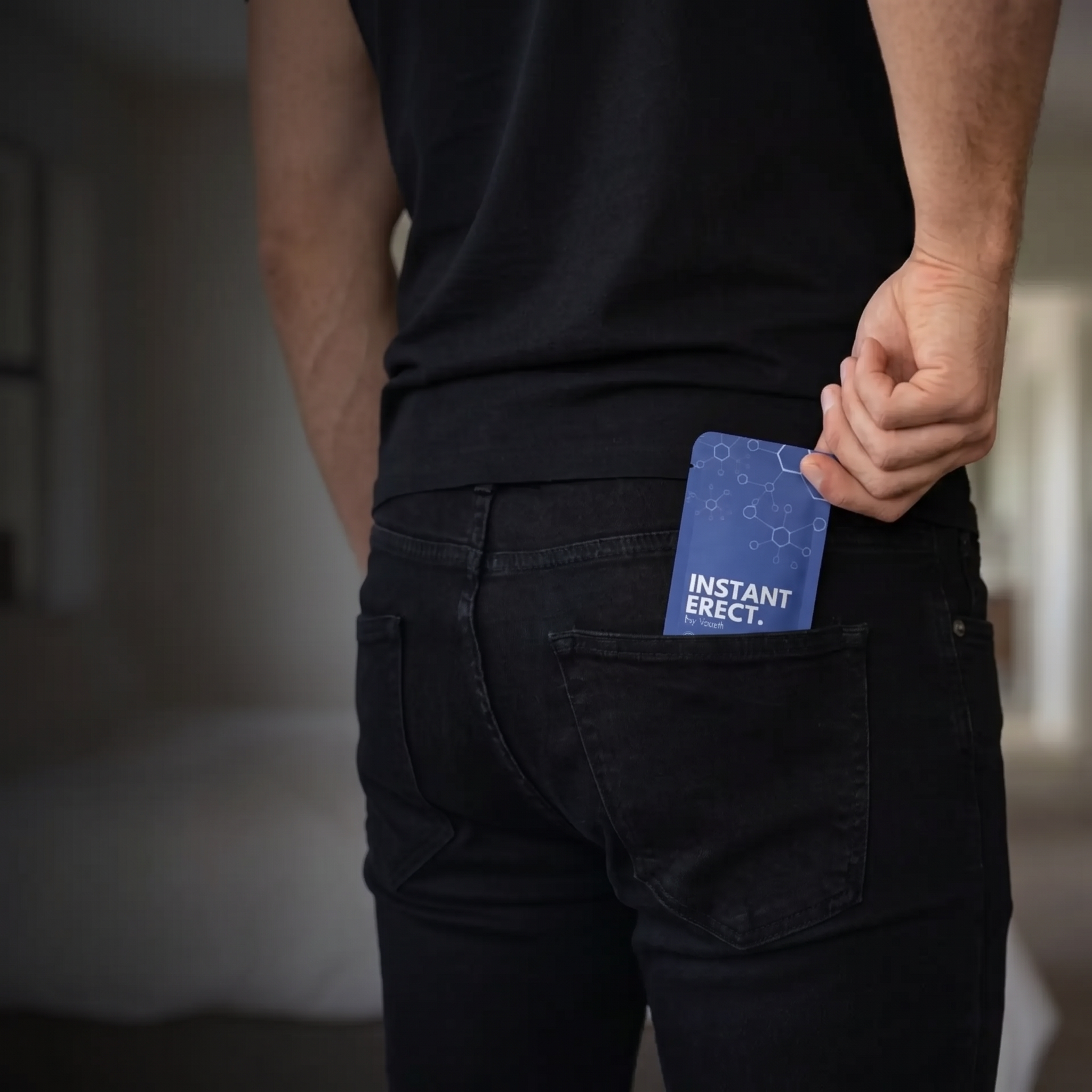 A slim Instant Erect sachet fitting discreetly into a trouser pocket